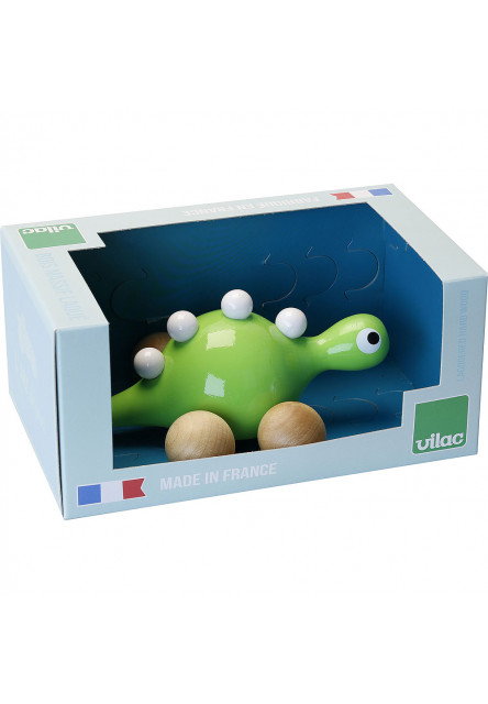 Drevený dinosaurus na kolieskach zelený